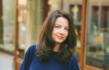 Outdoor close up portrait of beautiful mature 40 - 45 year old woman with brown hair